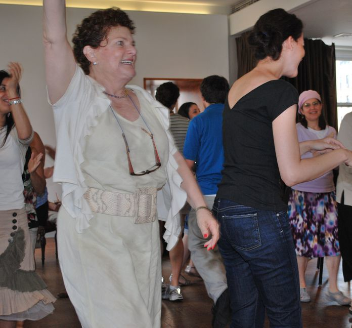 Photo of Ahuva Tal Hollander and others dancing